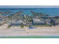 Aerial view of beachfront property, highlighting hotel, beach, and waterslide at 5500 Gulf Blvd # 2235, St Pete Beach, FL 33706