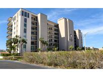 The Presidential 7000 building, featuring multiple stories and a spacious facade at 7600 Sun Island S Dr # 107, South Pasadena, FL 33707