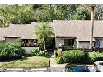 Quaint two-story townhouse with lush landscaping at 2920 Star Apple Ct, Palm Harbor, FL 34684