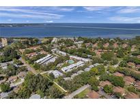 Aerial view of community near the waterfront at 1827 Pine Cone Cir, Clearwater, FL 33760