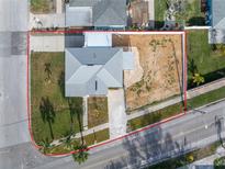 Aerial view of a single Gathering home and surrounding lot at 7951 Gulf Blvd, St Pete Beach, FL 33706