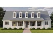 Charming two-story home with gray roof and shutters at 965 48Th N Ave, St Petersburg, FL 33703