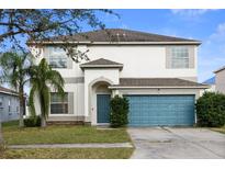 Two story home with attached garage at 10836 Standing Stone Dr, Wimauma, FL 33598