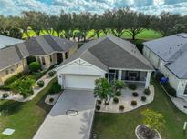Attractive single-story home with a well manicured lawn at 1120 Emerald Dunes Dr, Sun City Center, FL 33573