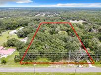 Aerial view of wooded lot, ready to build at 16206 Boyette Rd, Riverview, FL 33579