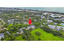 Aerial view of the property and its surroundings at 14880 Shipwatch Trce # 1915, Largo, FL 33774