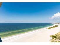 Stunning panoramic view of the ocean and beach from a high-floor condo at 1390 Gulf Blvd # 1204, Clearwater, FL 33767
