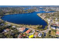 Aerial view showing home's location on waterfront property with canal access at 603 Virginia Ave, Tarpon Springs, FL 34689