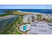 Beautiful waterfront condo with resort-style pool and lush landscaping at 795 Collany Rd # 304, St Petersburg, FL 33715