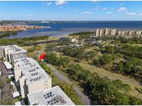 Condo building and surrounding landscape at 2700 Cove Cay Dr # 3F, Clearwater, FL 33760