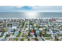Aerial view of beach town home with ocean in background at 16202 3Rd St E, Redington Beach, FL 33708