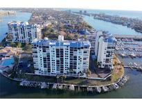 Waterfront condo community with marina access offering scenic views and convenient parking at 9415 Blind Pass Rd # 905, St Pete Beach, FL 33706