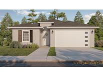 Charming single-story home with a two-car garage and landscaped front yard at 2713 San Luis Rd, Holiday, FL 34691