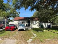 Charming bungalow with a spacious front yard and mature trees at 8218 N 18Th St, Tampa, FL 33604