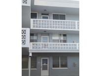 Three-story building with multiple units and balconies at 4880 Locust Ne St # 234, St Petersburg, FL 33703