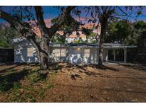 Updated single-story home with a covered carport and mature landscaping at 2412 38Th W Ave, Bradenton, FL 34205