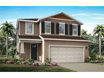 Two-story home with neutral siding, shutters, and a two-car garage at 31210 Pendleton Landing Cir, Wesley Chapel, FL 33545