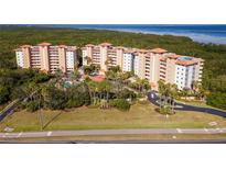 Aerial view of condo building and surrounding landscape at 12077 Gandy N Blvd # 374, St Petersburg, FL 33702