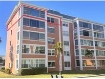 Orange building exterior with multiple windows and balconies at 6960 20Th N Ave # 501, St Petersburg, FL 33710