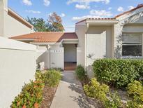 Inviting condo entrance with well-manicured landscaping at 4847 Napoli Ne Ct # 4847, St Petersburg, FL 33703