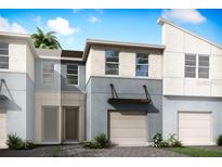 Modern two-story townhome with attached garage and neutral color palette at 3234 Sunrise Spring Pl, Brandon, FL 33511