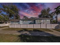 Updated bungalow with a fenced yard and modern exterior at 1846 3Rd S St, St Petersburg, FL 33705