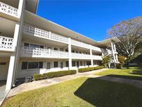 Two-story condo building with landscaped grounds and a spacious layout at 1235 S Highland Ave # 2-308, Clearwater, FL 33756