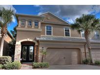 Attractive two-story home with double doors and two-car garage at 11112 Roseate Dr, Tampa, FL 33626