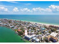 Gorgeous waterfront condo on the beach with boat docks and stunning views of the Gulf of Mexico at 143 94Th Ave # 2, Treasure Island, FL 33706