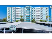 Condominium building exterior with parking at 17400 Gulf Blvd # I5, Redington Shores, FL 33708