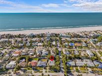 Aerial view of home near beach, showcasing location and neighborhood at 35 Juniper Way, Clearwater Beach, FL 33767