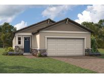 One-story home with a two-car garage and attractive landscaping at 11286 Boundless Ter, Venice, FL 34293