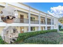 Inviting condo building with well-maintained landscaping and exterior balconies at 2060 Marilyn St # 241, Clearwater, FL 33765