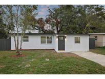 Updated home exterior boasts a modern design and curb appeal at 11747 104Th St, Largo, FL 33773