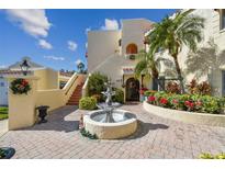 Spanish style building exterior with fountain and landscaping at 6101 34Th W St # 29C, Bradenton, FL 34210