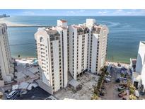 Aerial view of a high-rise building with oceanfront location at 440 S Gulfview Blvd # 905, Clearwater Beach, FL 33767