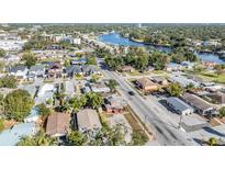 Aerial view showing home's location in a residential neighborhood near the water at 3306 N Howard Ave, Tampa, FL 33607