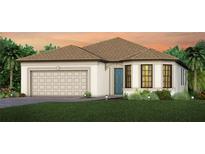 One-story home with light brown tile roof, beige walls, and teal front door at 17203 Luminous Ave, Venice, FL 34293