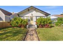 Charming bungalow with landscaped lawn and walkway at 2747 3Rd N Ave, St Petersburg, FL 33713