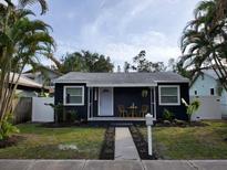 Charming bungalow with modern exterior, walkway, and landscaping at 670 16Th S Ave, St Petersburg, FL 33701