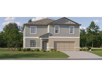 Two-story house with gray siding, beige garage, and landscaping at 17650 Shirewood Way, Land O Lakes, FL 34638