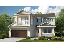 Two-story house featuring a brown garage door and balcony at 5136 Slate Hue Pl, Apollo Beach, FL 33572