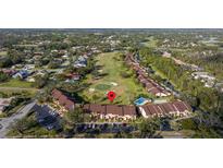 Aerial view of condo community near golf course at 6211 Timber Lake Dr # B8, Sarasota, FL 34243