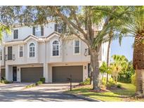 Townhouse exterior with two-car garage at 4603 Overlook Ne Dr, St Petersburg, FL 33703