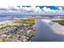 Aerial view of the property and surrounding waterfront area at 6613 Seabird Way, Apollo Beach, FL 33572