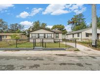 Cute bungalow style home with a fenced yard at 3706 N 35Th St, Tampa, FL 33610