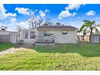 One-story home with a small front porch and yard at 154 81St N Ave, St Petersburg, FL 33702