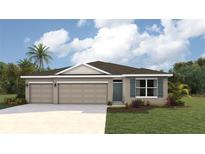 Charming single-story home with a three-car garage and landscaped yard at 17451 Whiskey Creek Trl, Parrish, FL 34219