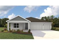 Single-story home with two-car garage and landscaped front yard at 17455 Whiskey Creek Trl, Parrish, FL 34219