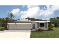 Exterior view of a single-story home with a three-car garage, landscaping, and a welcoming entryway at 17463 Whiskey Creek Trl, Parrish, FL 34219